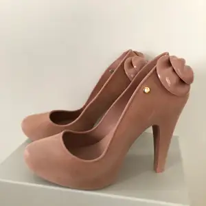 Rubber high heels from Melissa. Nude color, comfortable and classy. Great for the beach party or night out