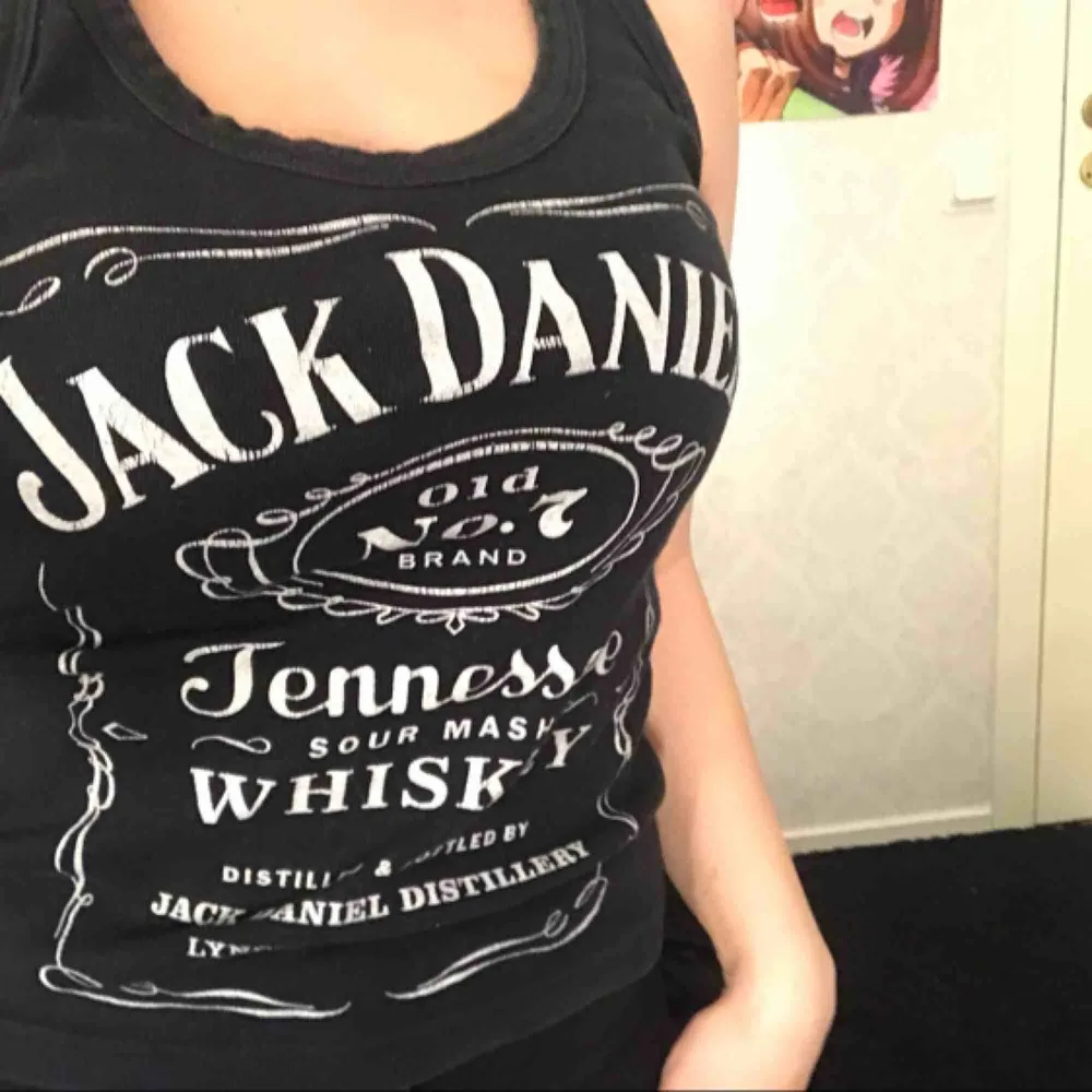 Jack Daniels topp inköpt utomlands. Toppar.