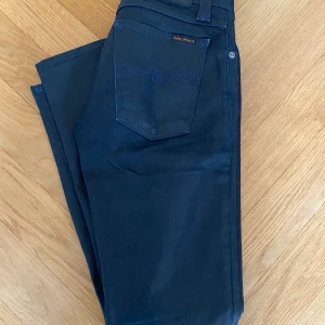 Nudie jeans drainpipe fit w26 l28 - Great condition, barely worn Nudie jeans. They were long and have been taken up to equivalent of leg 26/28. Denim has an oil/ petrol finish 
