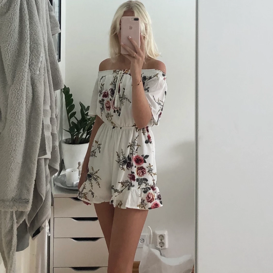 Blommig byxdress - 90