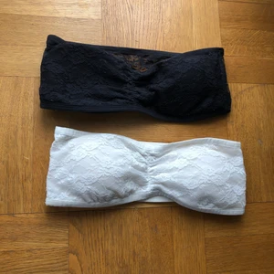 Svart/Vit bandeau bh-ar  - 2 stycken bandeau bh-ar i storlek S. Bra skick. Säljes för 70 kr paket pris och 40 kr styck. Köpare står för frakten 