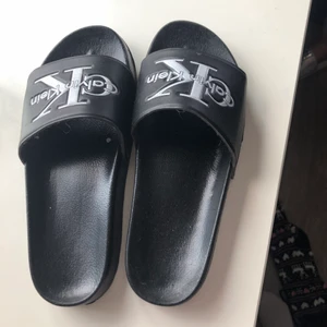 Ck tofflor - Ck tofflor oäkta använda 3-4 gånger stl 37