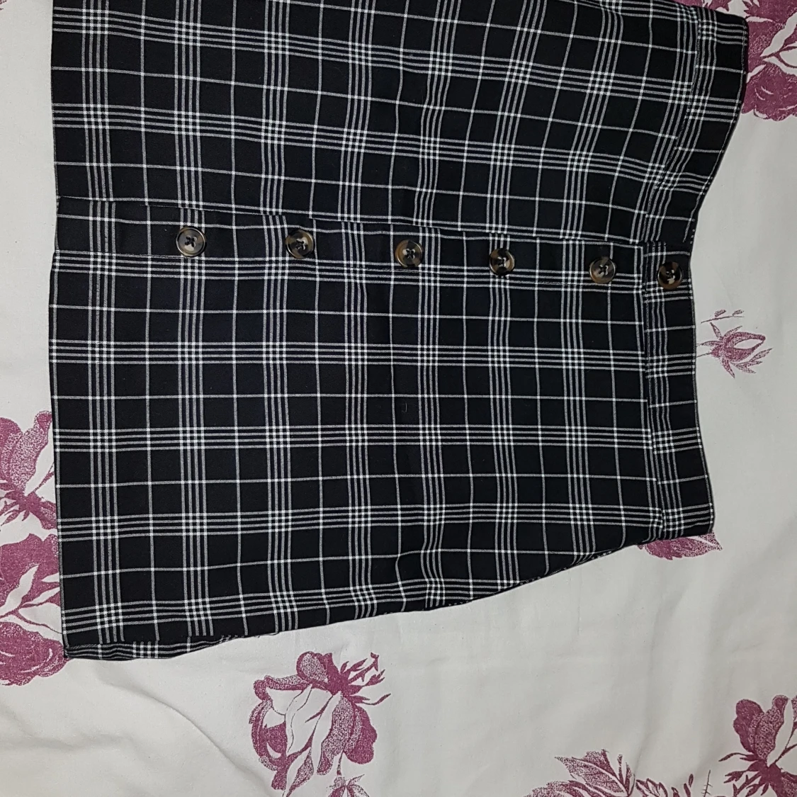 Svart- och vitrutig kjol i strl 40 - 90