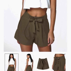  - Militärgröna shorts med knytband  Från Boohoo  Inte mycket använda  Frakt tillkommer! 