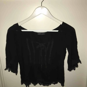  - Svart söt topp från Tessie