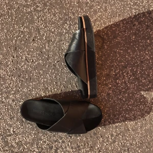  - Black sandals from Samsoe Samsoe in leather and suede. They are worn maybe twice indoors. The sole is thick and easy to walk with. Selling these because they are too big., I'm a size 38. 