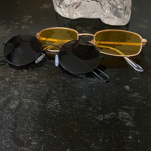 Solglasögon - Knappt använda. De svarta har några små repor. 30kr/st. 50 för båda (gula är sålda). 