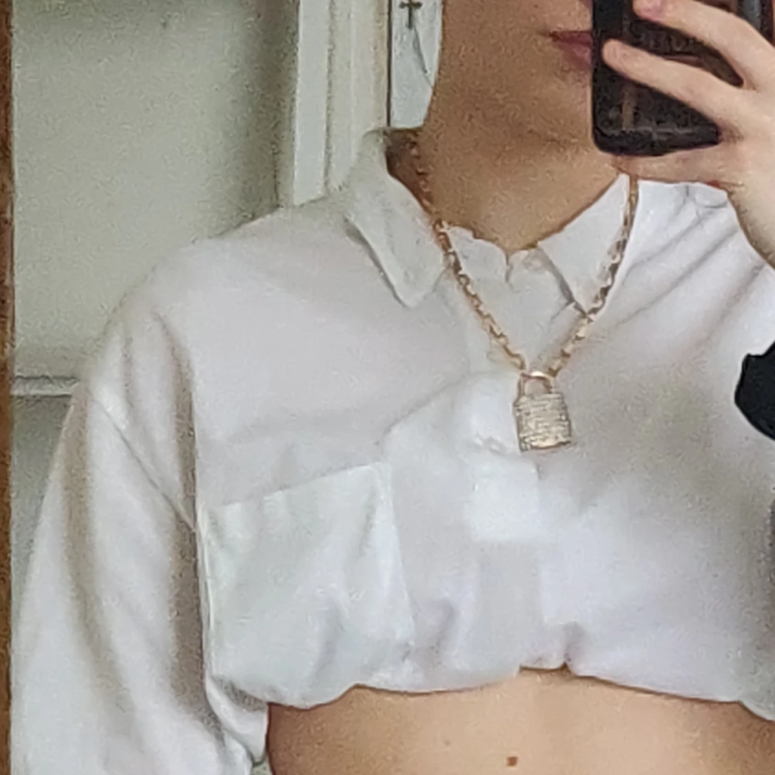 Guldigt hänglås halsband