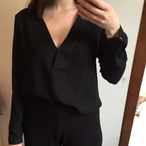  - Svart fin topp. Knappt använd. 