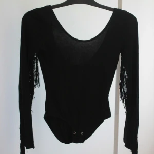  - supersnygg body med fransar från primark i London. använd 1 gång :)