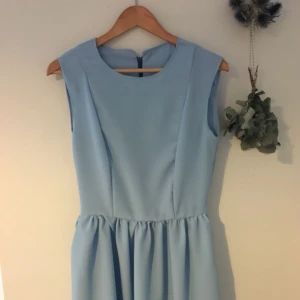  - Home made crepe de chine dress in gorgeous pale blue. Retro / vintage style. Lined bodice, soft and silky feel. Hidden zip. Only selling because I made it too big for me! 