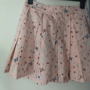 Tenniskjol - Ljusrosa tenniskjol i storlek 38. Aldrig använd