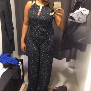  - Casual jumpsuit with very comfy stretchy fabric from mango. Never worn. Fits a size S-M