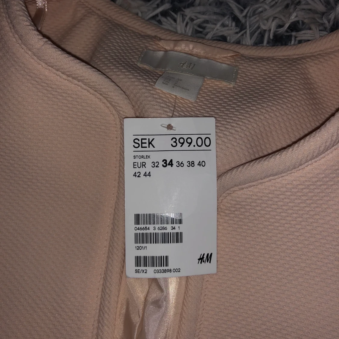 Oanvänd rosa kappa från H&M  - 90