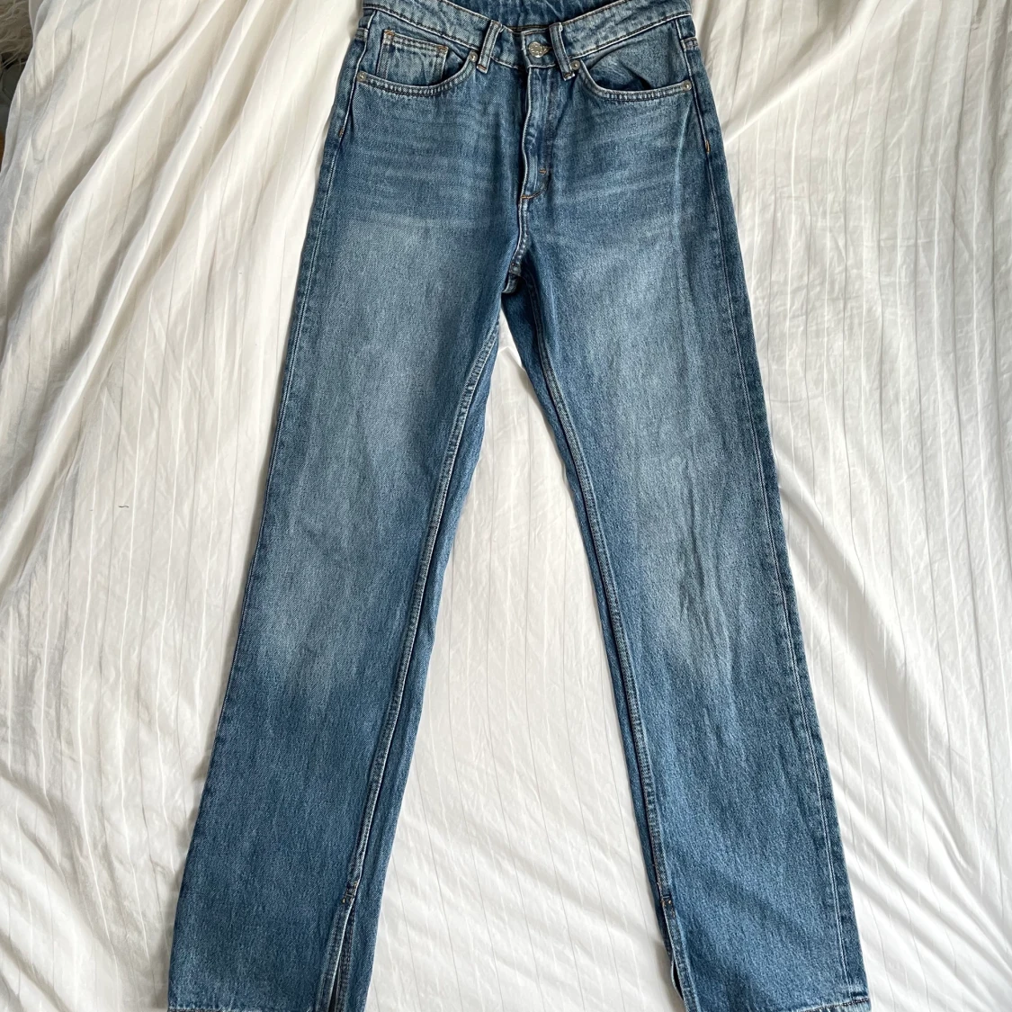 Raka jeans med slits strl 25