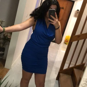 Blå klänning  - Helt ny, aldrig använd. Etiketten sitter fortfarande på ! 