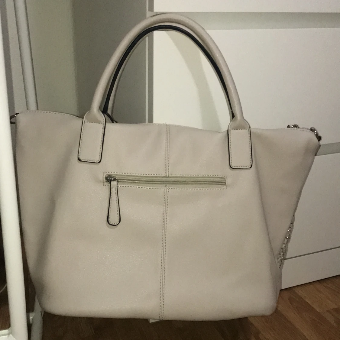 En beige handväska  - 91