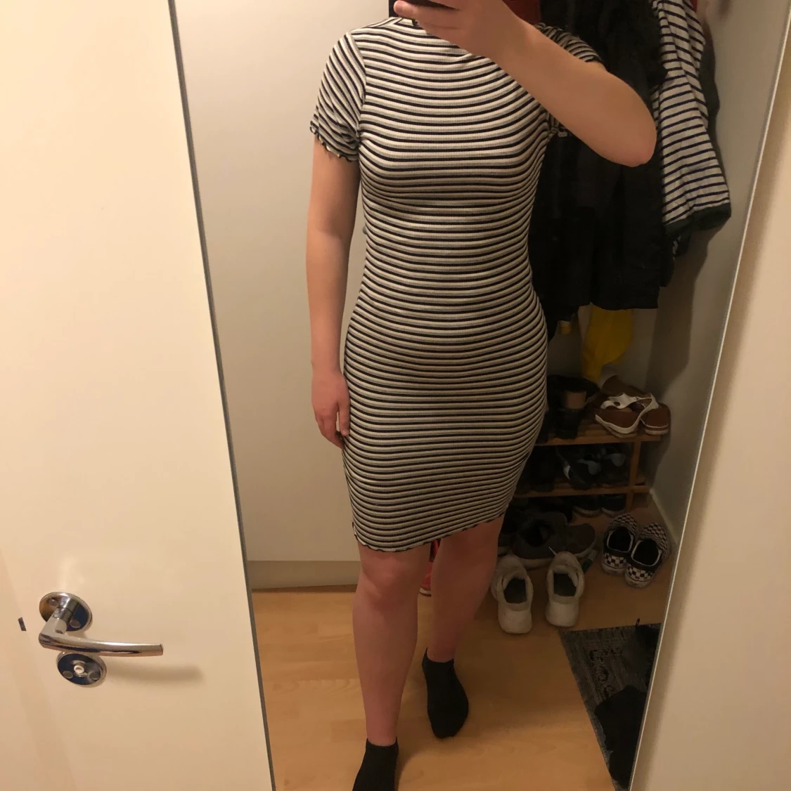 Tajt randig klänning