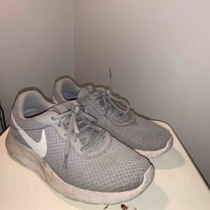 Nike grey and white shoes. Used a few times. Pay for shipping or transport. 