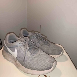  - Nike grey and white shoes. Used a few times. Pay for shipping or transport. 