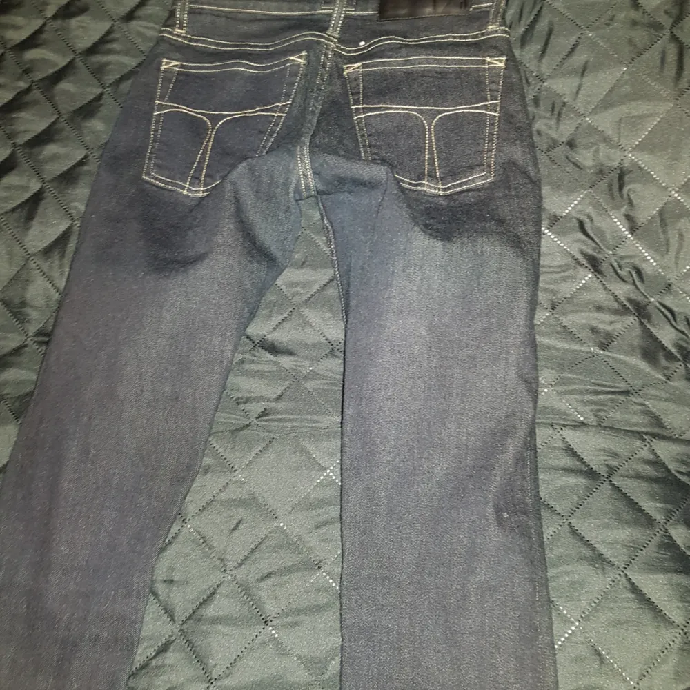 Säljer ett par tiger jeans som ny endast prövade. Storlek 26/34. Frakt tillkommer.. Jeans & Byxor.