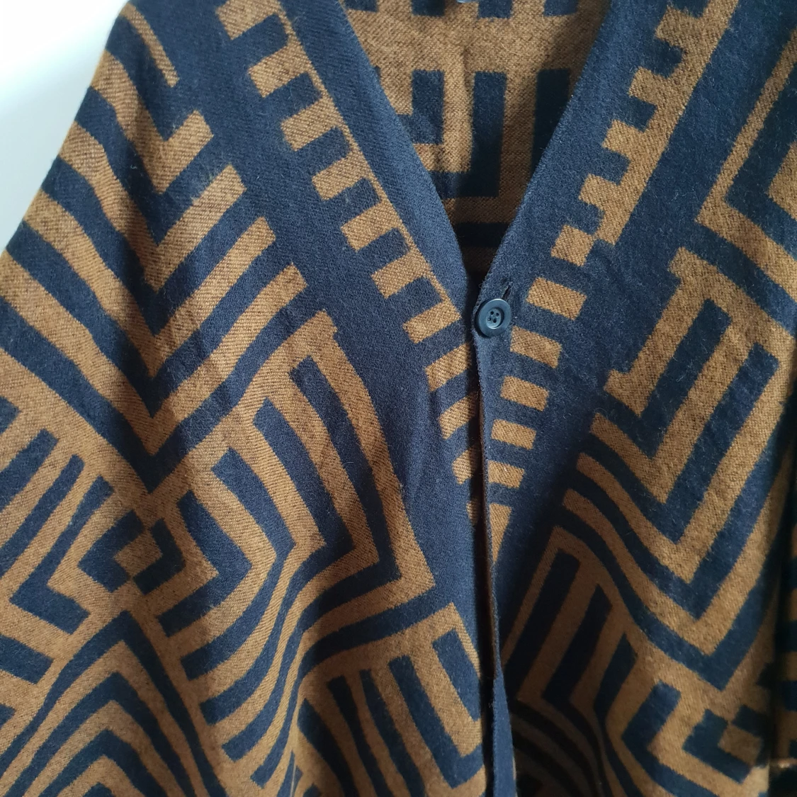 Poncho med snyggt grafiskt mönster