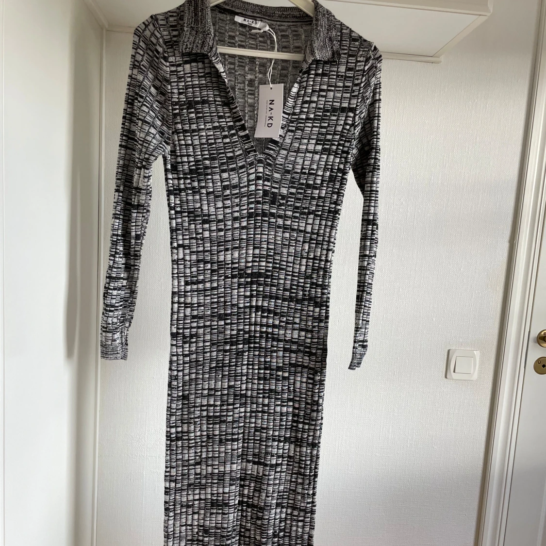 Ribbstickad klänning M - 91