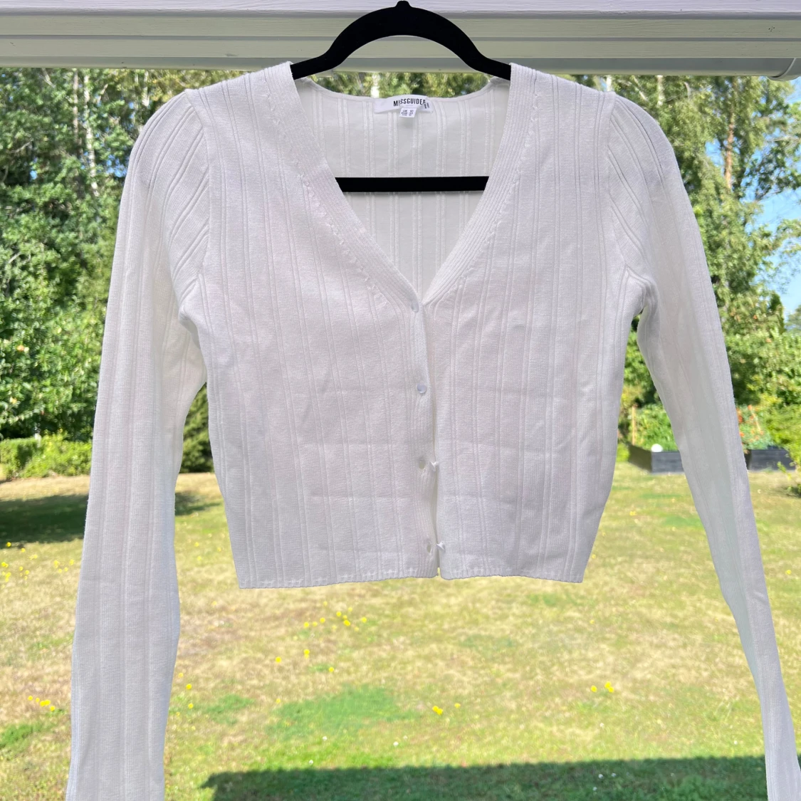 Croppad stickad tröja