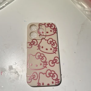 hello kitty skal - Beige, iphone 15 pro