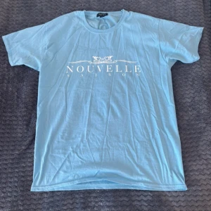 Blå T-shirt (Herr) - Herr t-shirt med tryck i strl S! Aldrig använd, bara testad