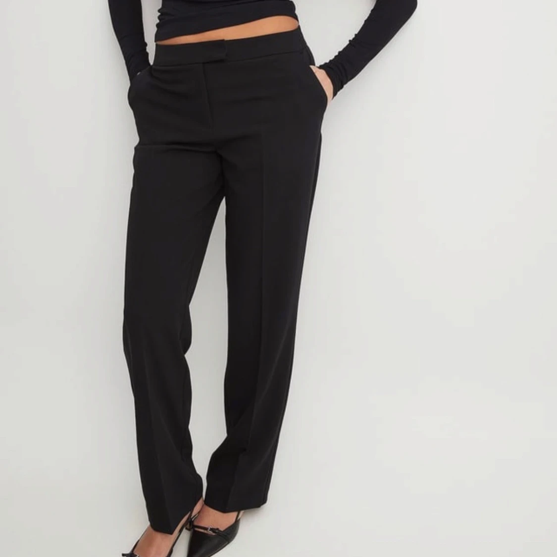 Svarta kostymbyxor