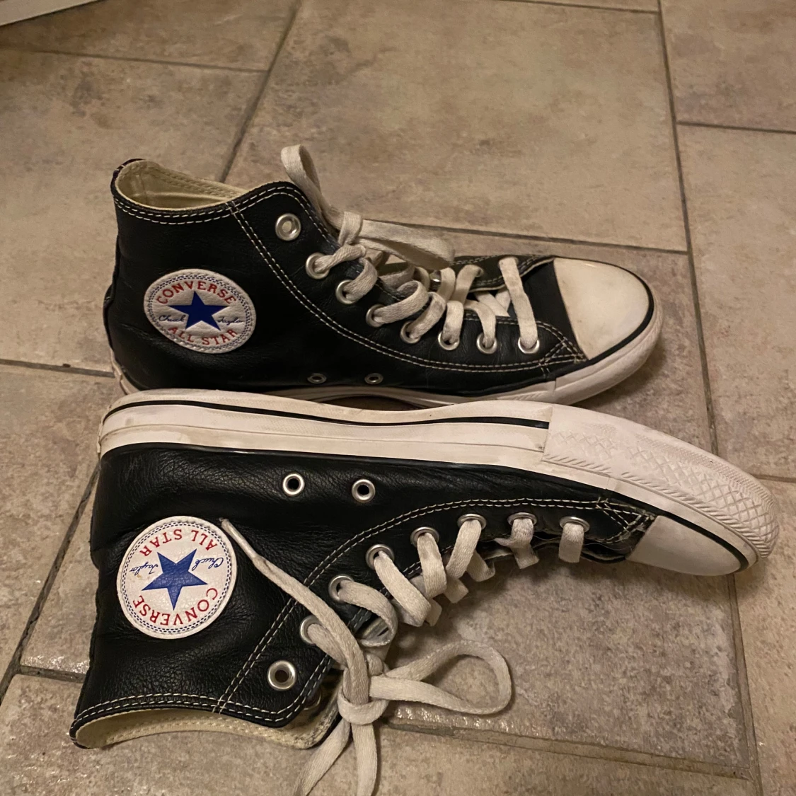 Svarta Converse All Star sneakers