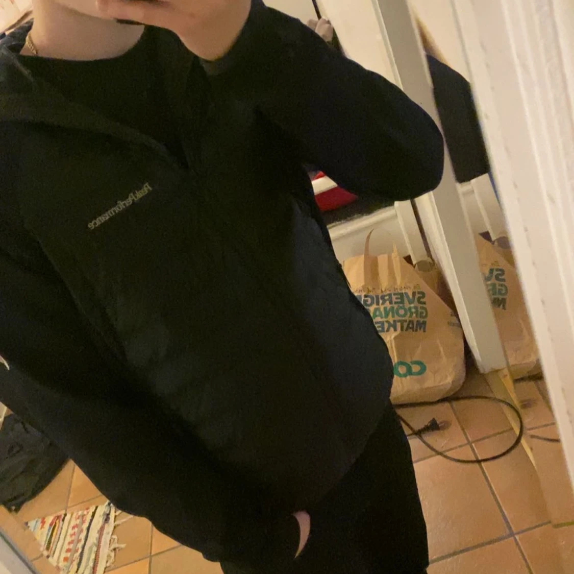 Svart cardigan från Peak Performance - 90