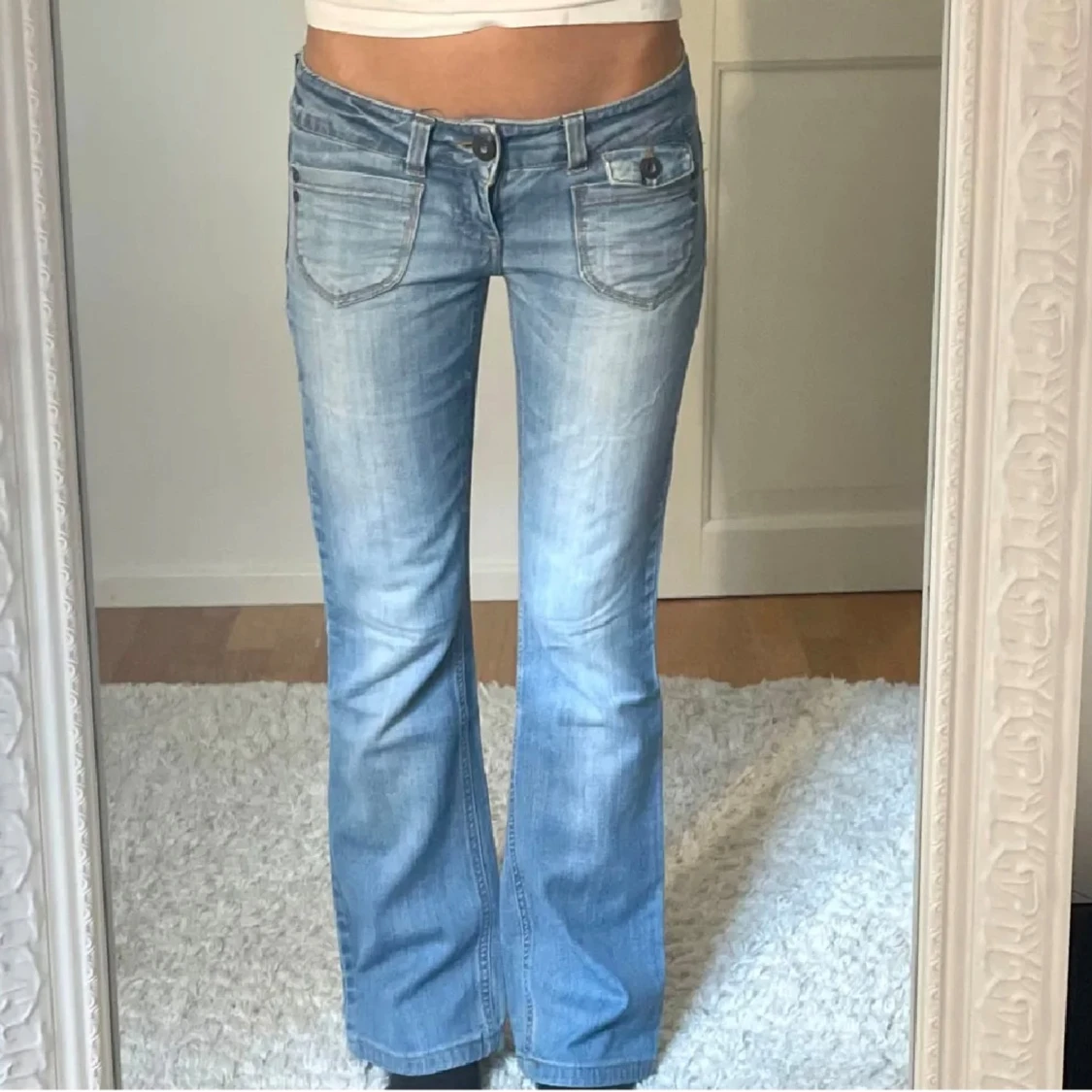 Ljusblåa jeans  - 91