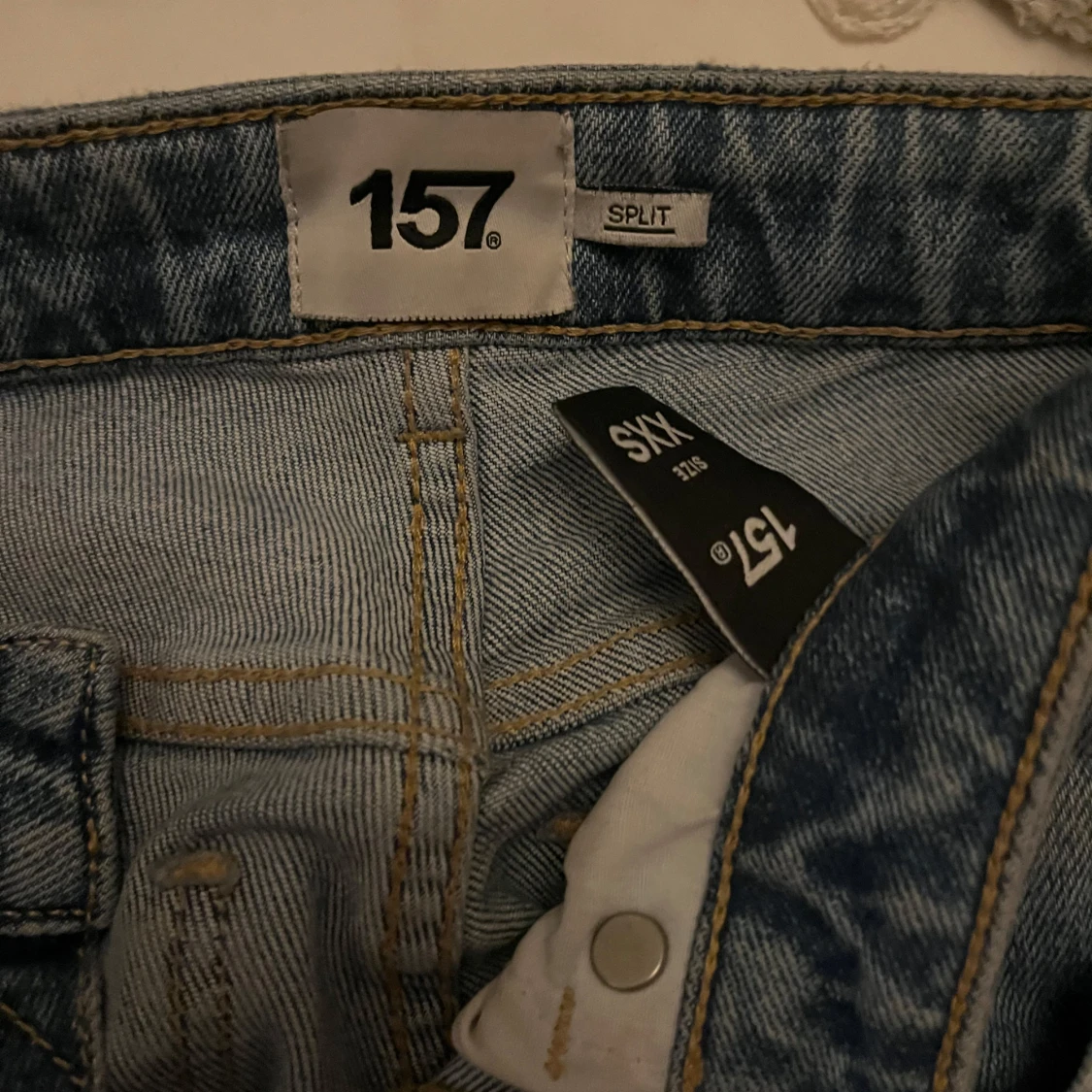 Blå jeans från 157