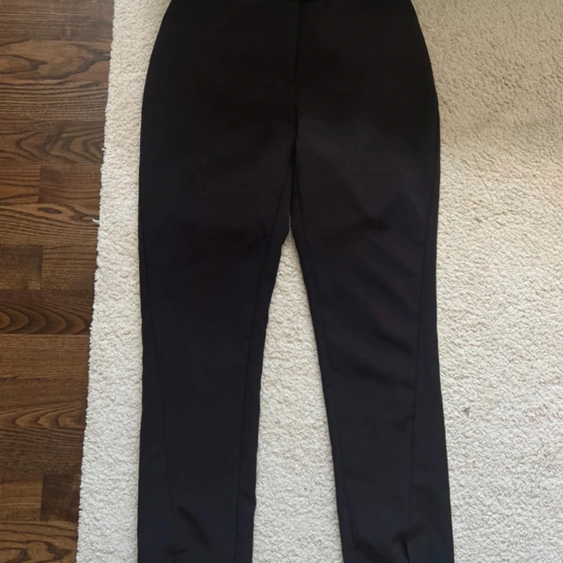 Svarta kostymbyxor