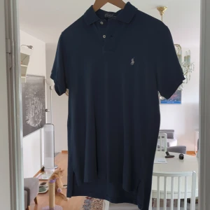 Piké från Ralph Lauren  - Använd men den är i bra skick.
