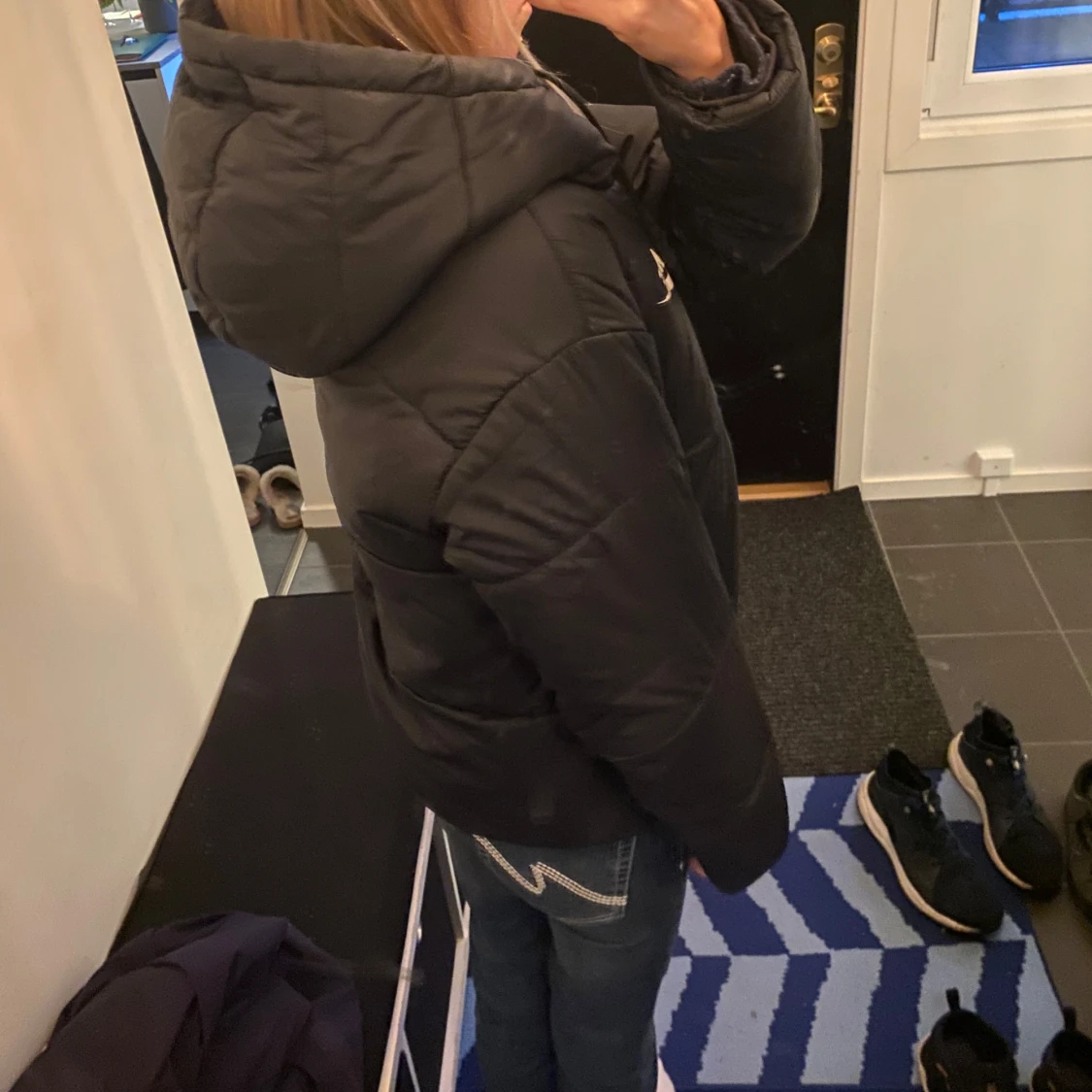 Svart dunjacka från Nike - 90