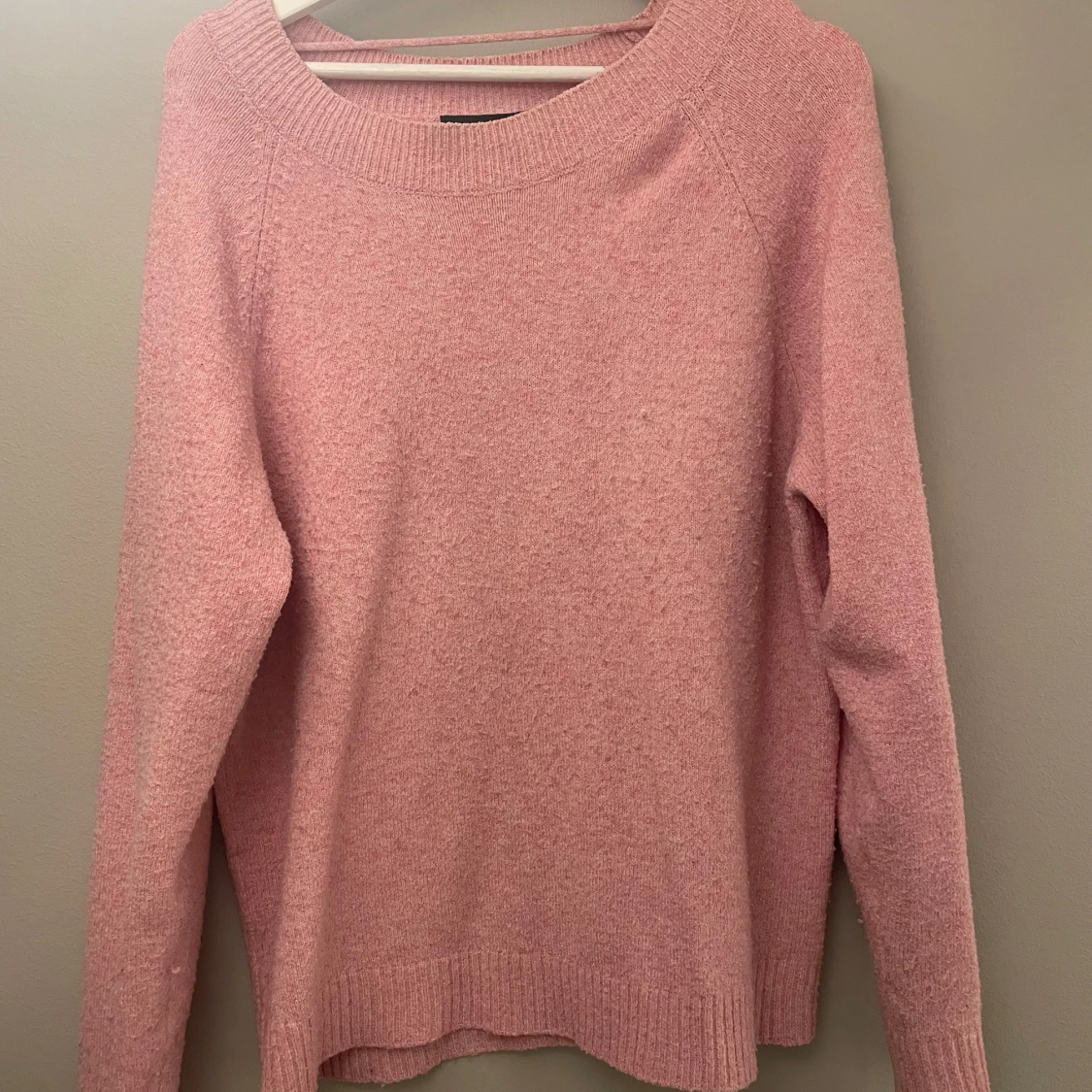 Rosa stickad tröja
