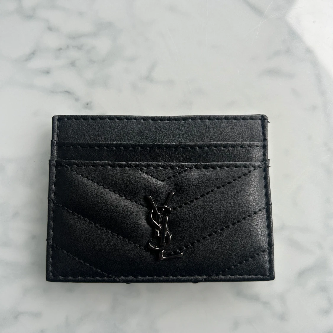 Ysl korthållare