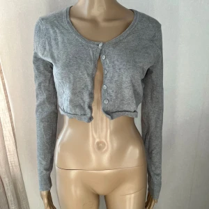 Kort kofta långärmad  - Inget att anmärka på 