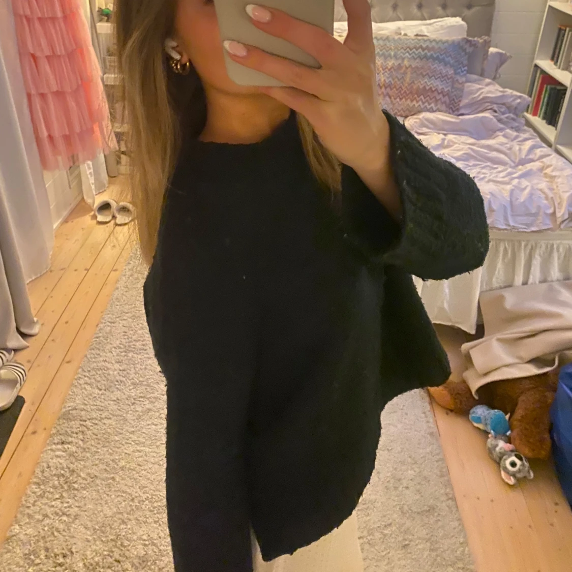 Svart stickad tröja