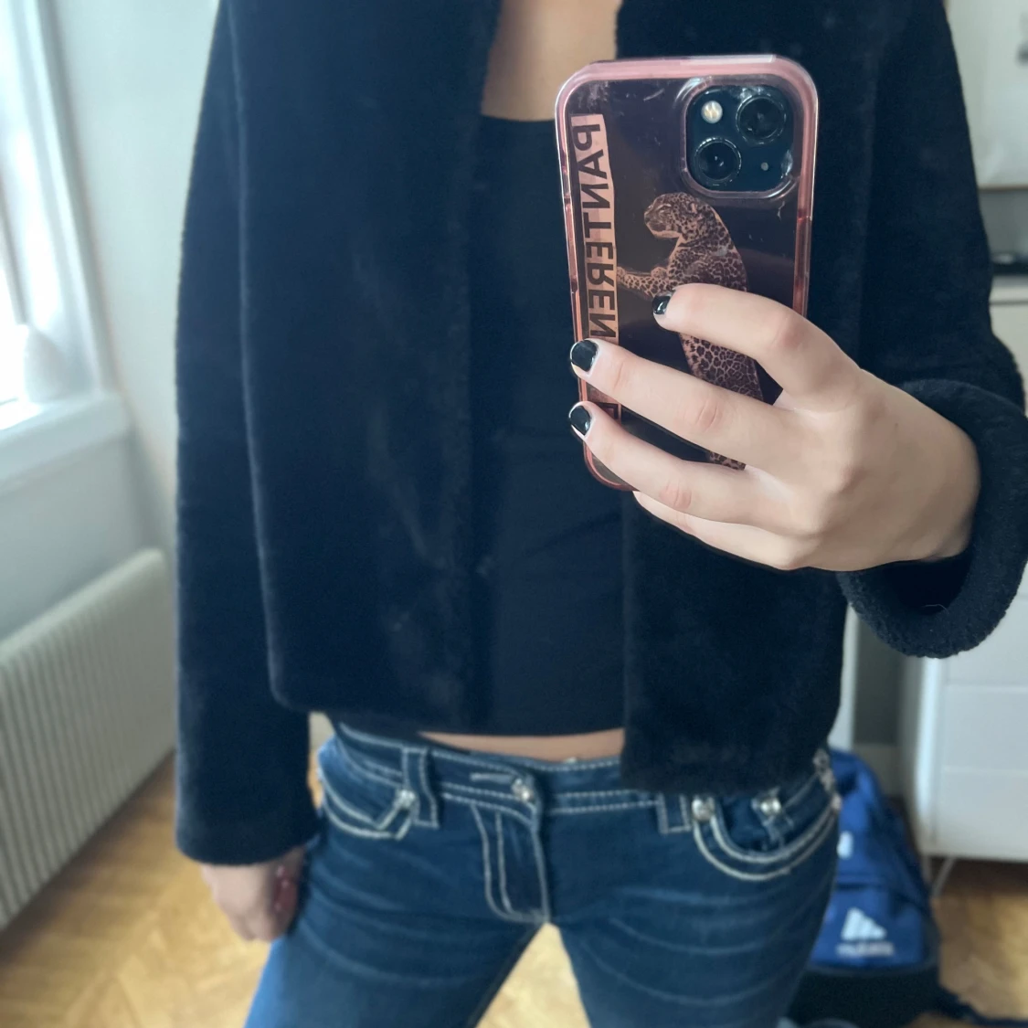 Svart pälsjacka från Gina Tricot