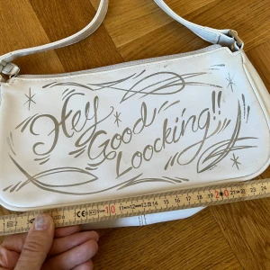 Väska pinstripe hey good looking rockabilly - Tecken på användning finns. Se bilder