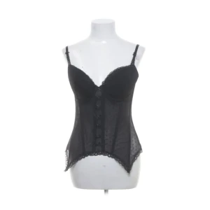 Korsett - supersnygg korsett som endast är testad :) söta rosettband på framsidan <3