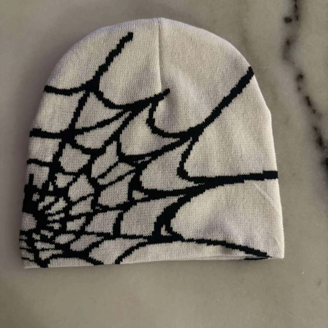 Svartvit Mössa