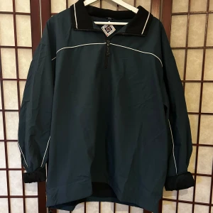 Grön vindjacka  - Grön vindjacka 