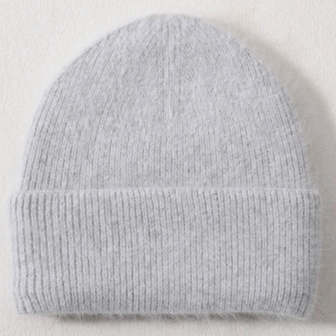 Fluffig mössa i ull - 90