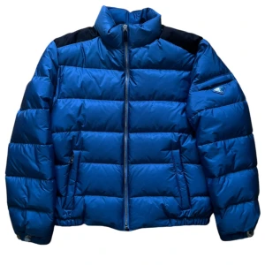 Prada Bicolor Puffer Jacket - Nypris 14000kr.  Bra skick 