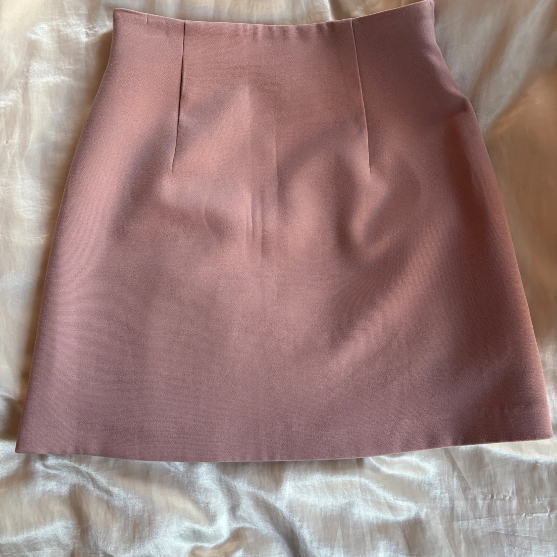 Rosa minikjol med knappar  - 90